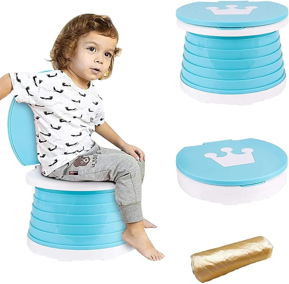 Baby boy using travel potty.