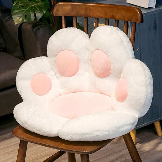 White cat paw cute cozy cushion on chair