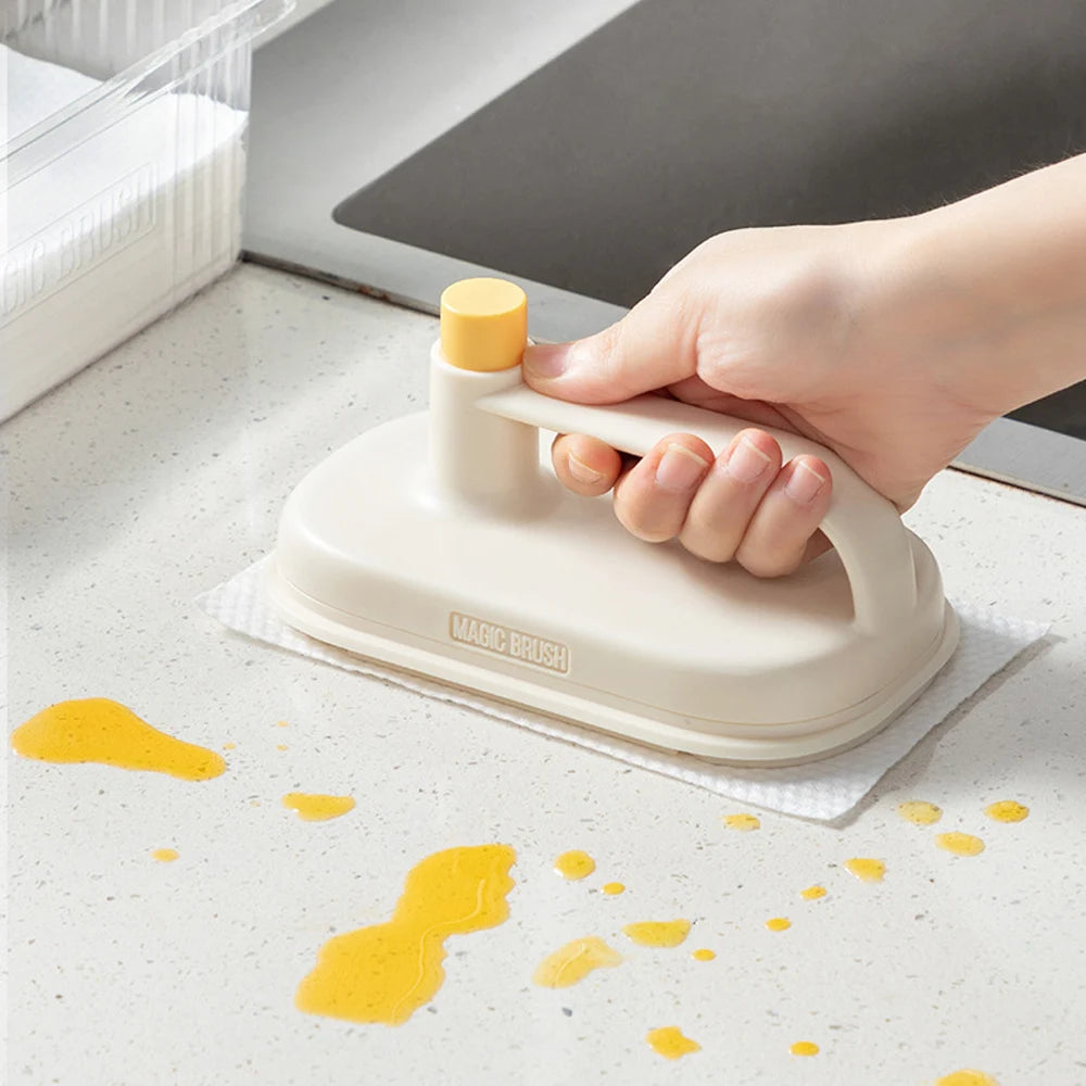 A Person s Cleaning Countertop Using Replaceable Cleaning Brush.