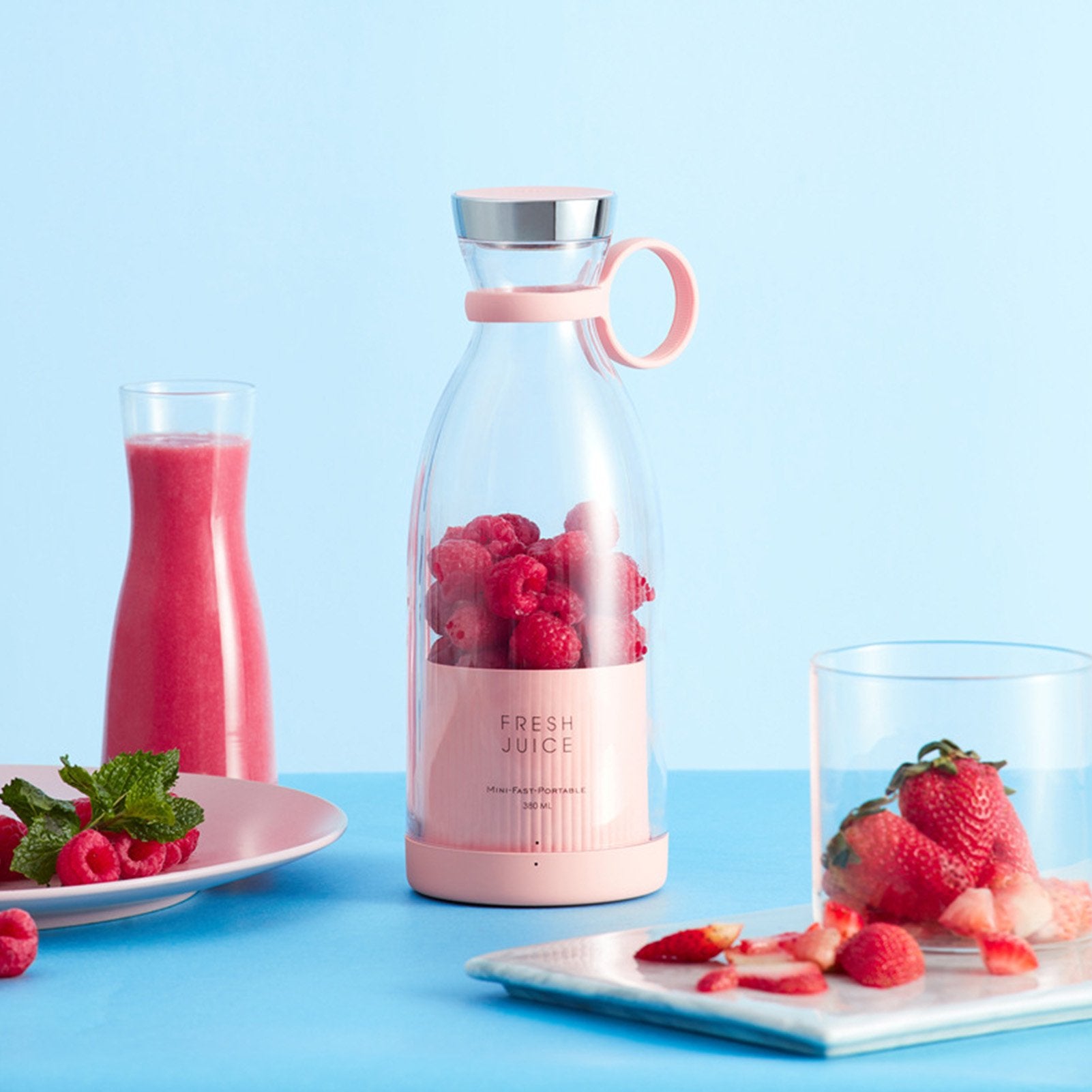 350ml Portable Instant Smoothie Juicer Blender with some strawberries in it