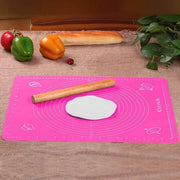 Non-stick Silicone Dough Mat next to some items