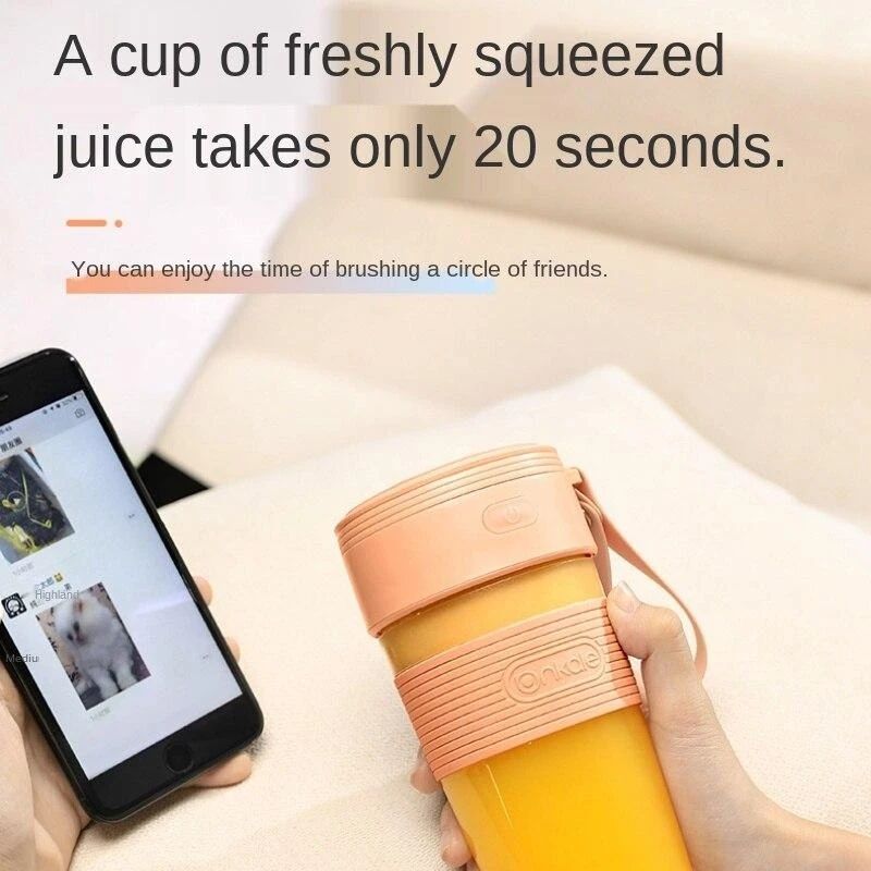 Someone holding a 300ml USB Portable Electric Juicer Blender