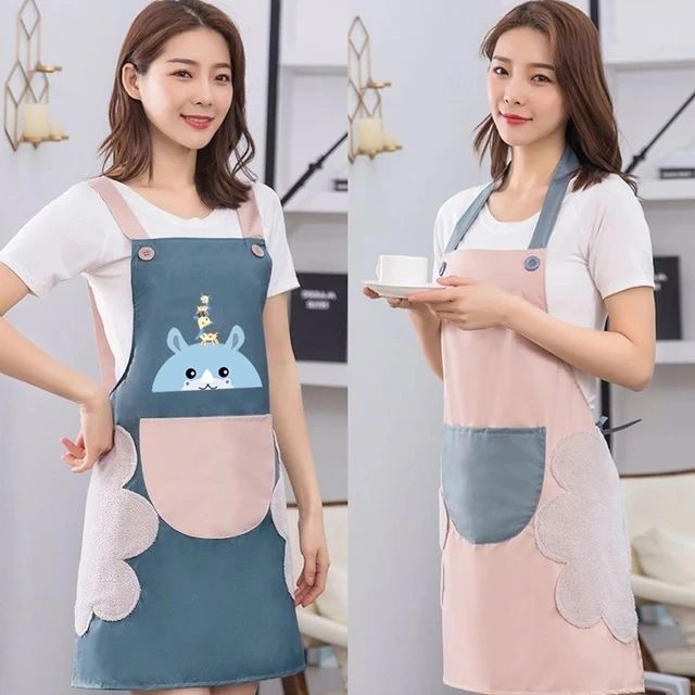 The girl wore a wipeable apron for the kitchen