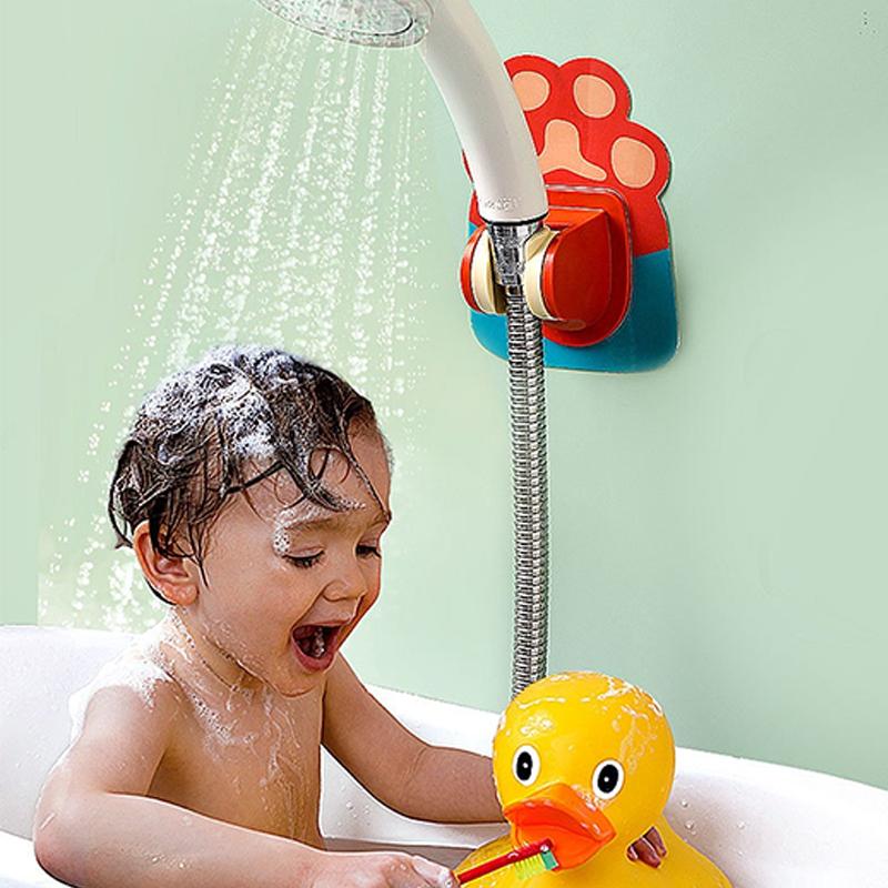 a child in a bathtub Taking shower with the use of Wall Mount Punch-free Cartoon Shower Bracket