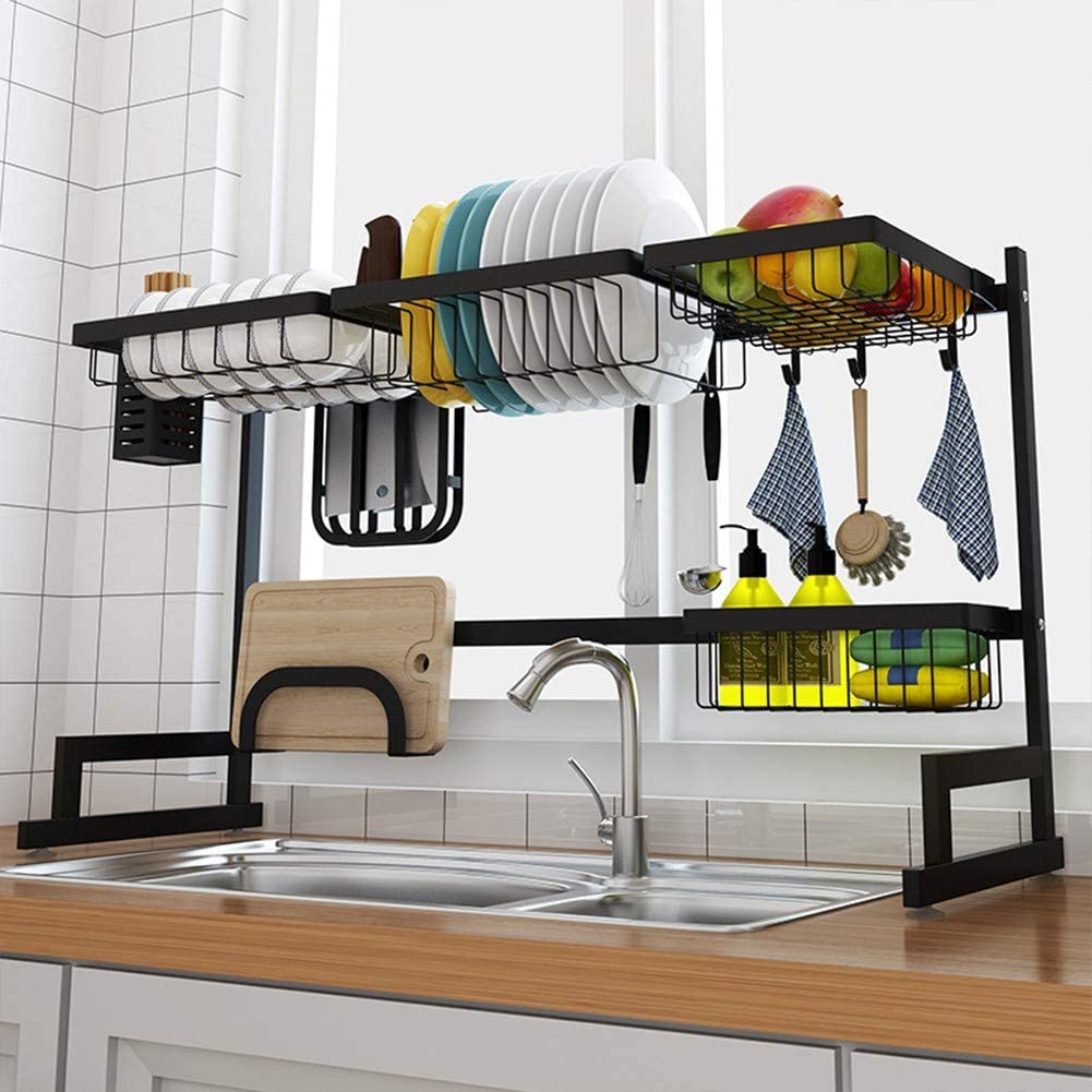 A dish rack with plates and dishes on it