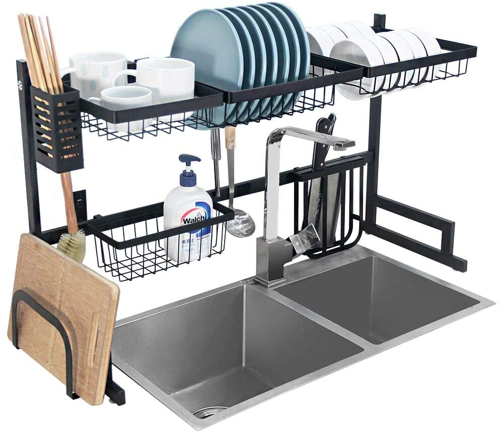 A dish drying rack with dishes and utensils