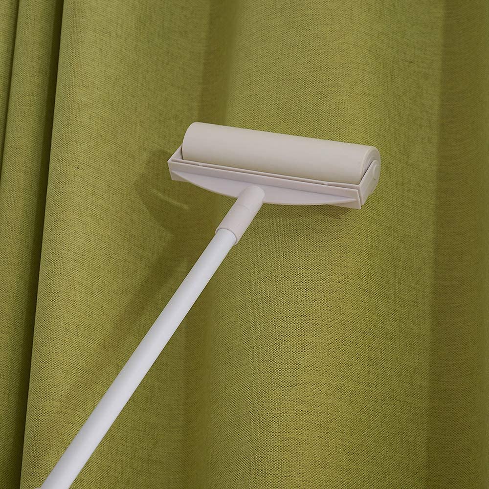 Sticky Mop with Sticky Paper Roller, 60 Sheets, rolling on the curtain