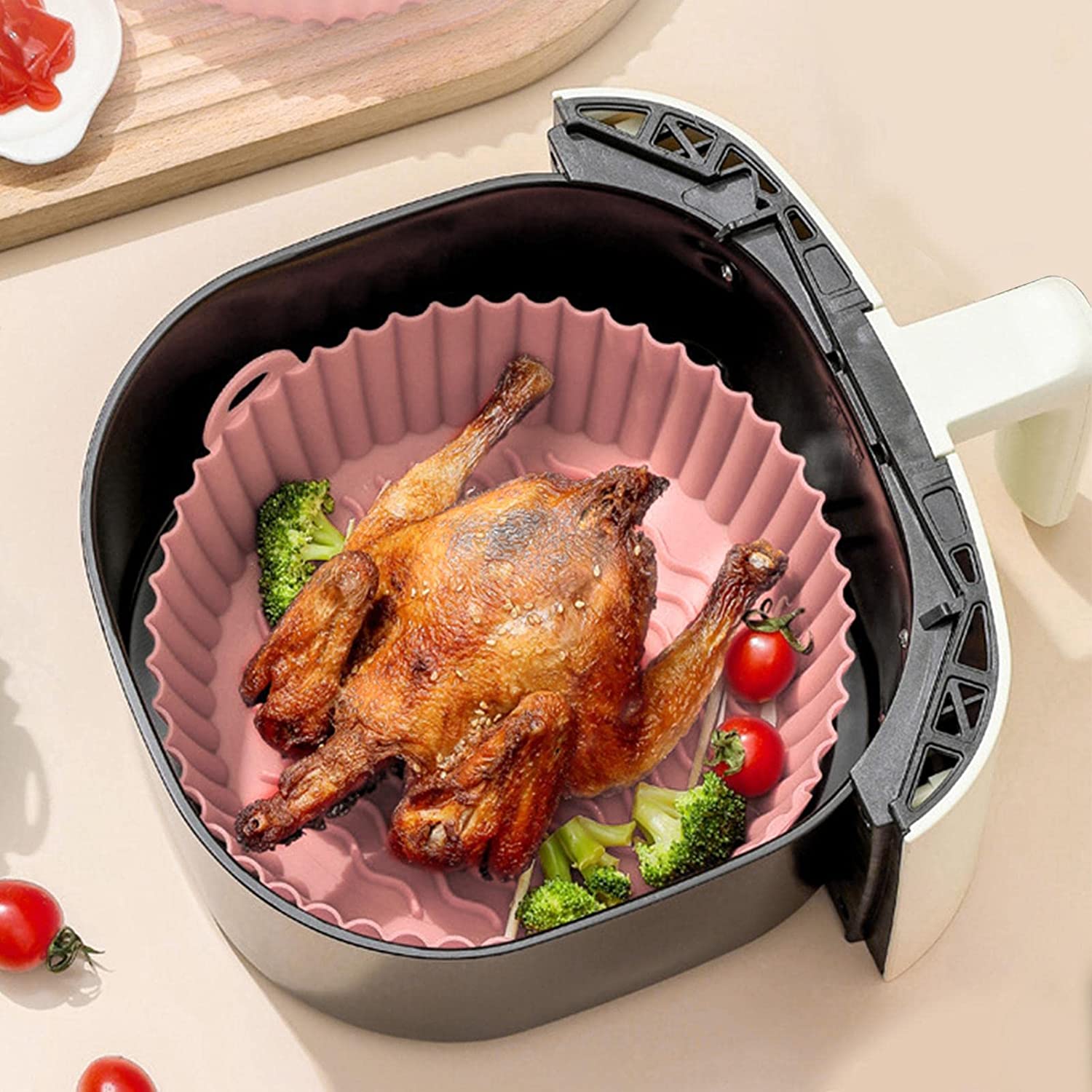 Cook with ease using this non-stick baking pot designed for air fryer baskets