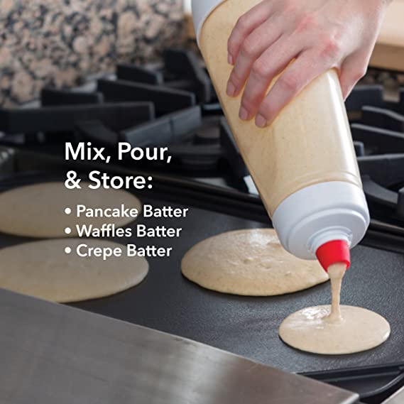 Someone making food with the help of the Whiskware Pancake Batter Mixer