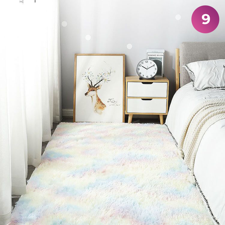 An Ultra Soft Indoor Rug is placed in a room next to the bed