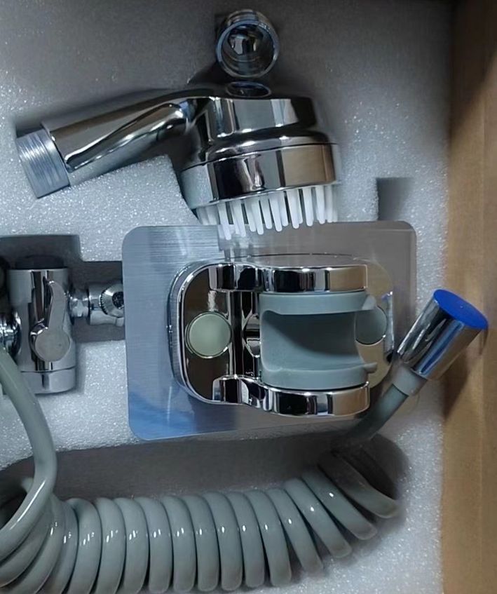 Disassembled Rotatable Washbasin Faucet Shower Set inside its box