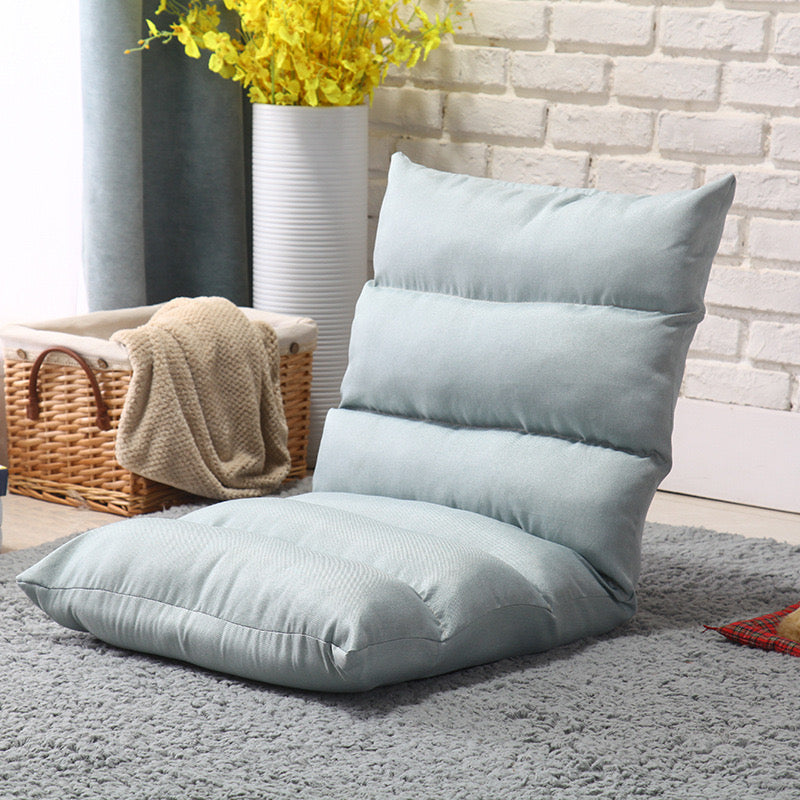 Light blue color Lazy Lounge Sofa Bed placed near to a basket with cloths