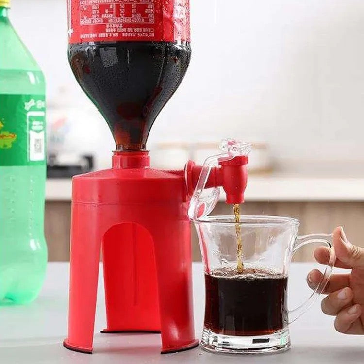 A person utilizes the Inverted Easy Soda & Cool Drinks Dispenser to pour a beverage