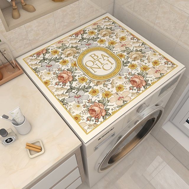 A washing machine covered with Dust Proof Top Cover Mat