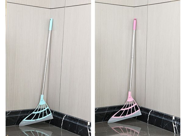 Two different-colored Multifunction Magic Brooms with Adjustable Length placed in the room