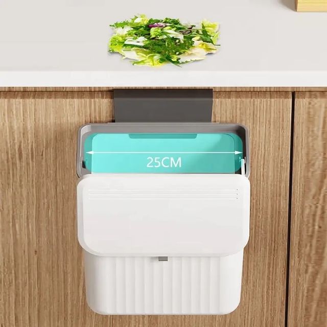 The 9L Trash Can Wall Mounted Hanging Bin is placed in the kitchen