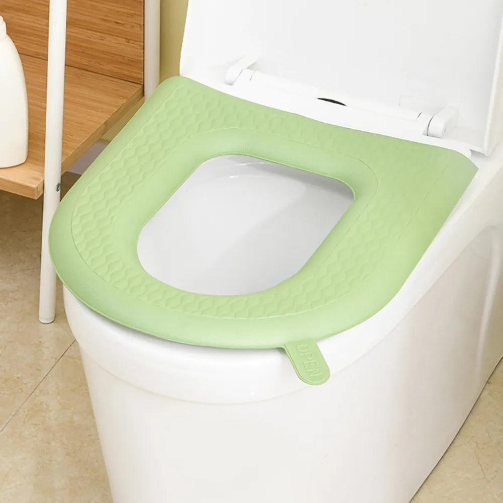 Toilet seat cover cushion pad installed on toilet