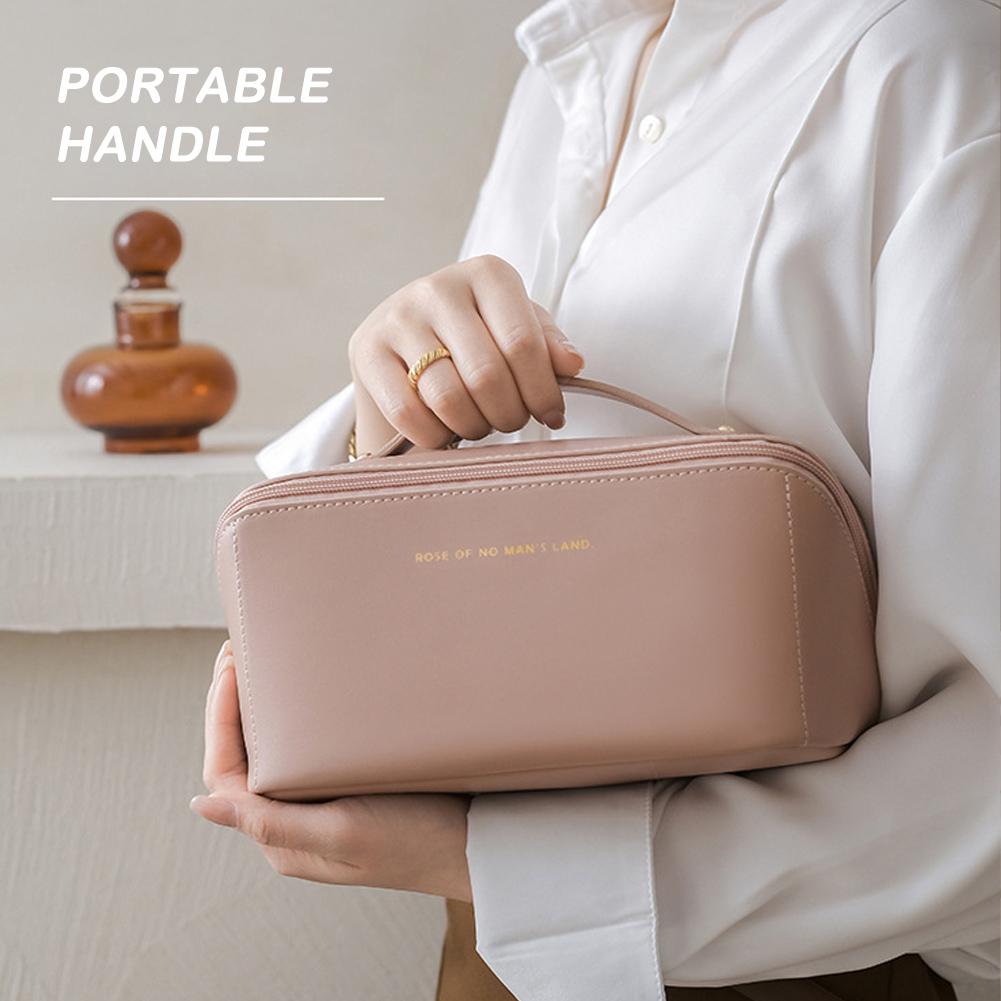 A lady holding Large Capacity Foldable Travel Cosmetic Bag