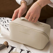 A lady holding Large Capacity Foldable Travel Cosmetic Bag 