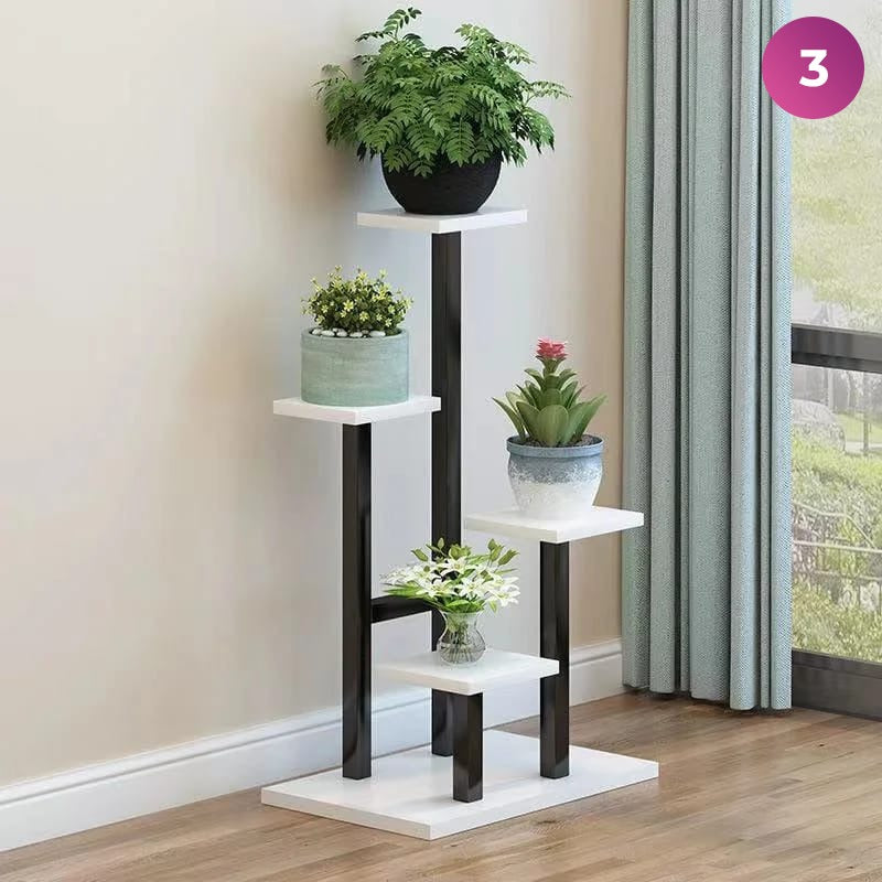 4-Layer Indoor Plant Stand with some plants placed next to a window in a room