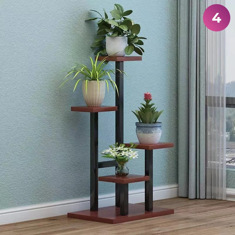 4-Layer Indoor Plant Stand with some plants placed next to a window in a room