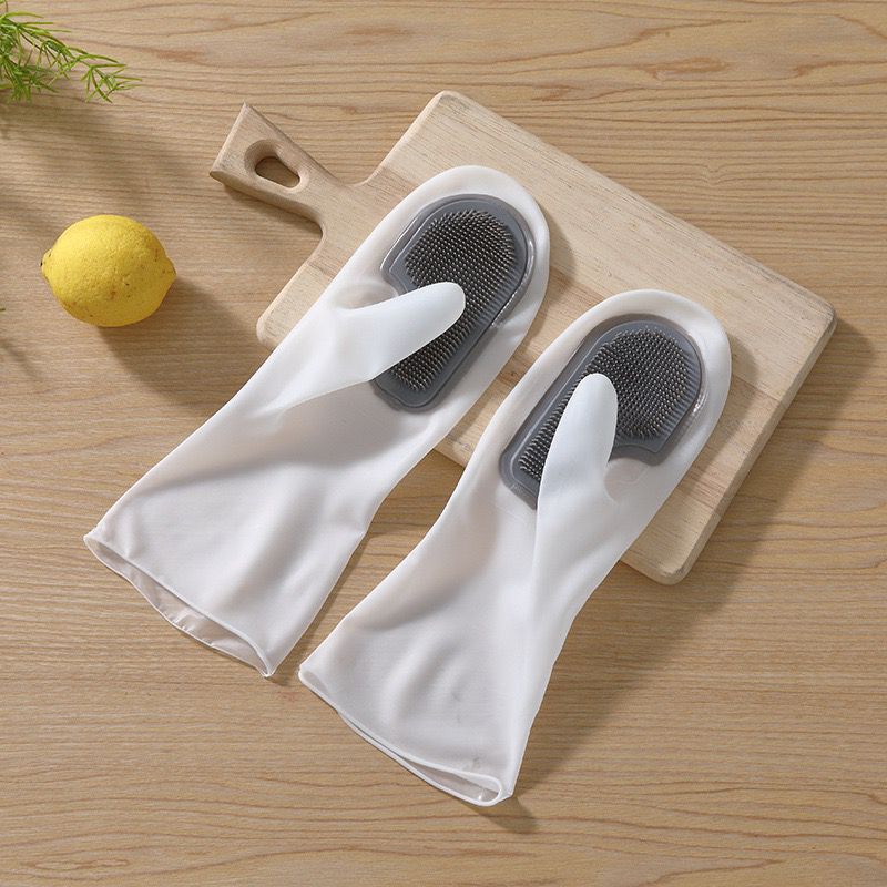 1 pair of silicone gloves for dishwashing placed on the wood in gray color