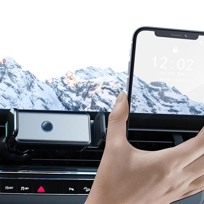 Someone is placing a phone into the Automatic Sensor Intelligent Car Mobile Phone Holder