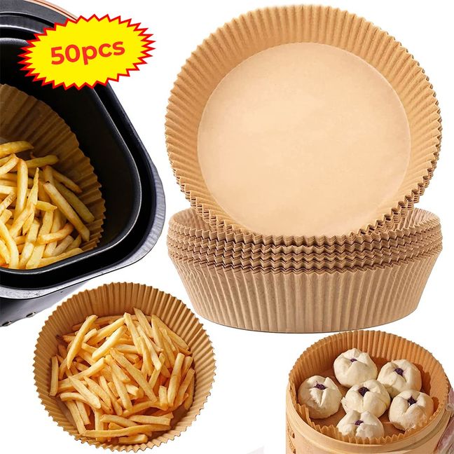 A group of disposable air fryer paper liners with food in them