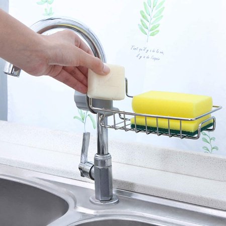 Someone taking something from the Sponge Holder Sink Organizer Drainer Faucet Hanging Storage Rack