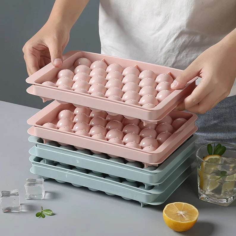 A person holding Cavities Plastic Ice Cube Mold Tray