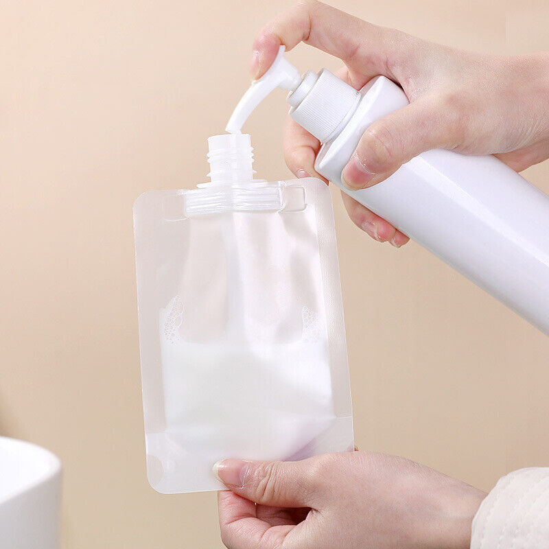 a person pouring a white liquid into a Liquid Dispenser Bag
