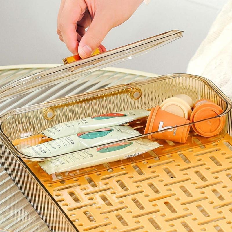 Someone is holding a part of the Double Layer Drain & Dining Tray for the home kitchen