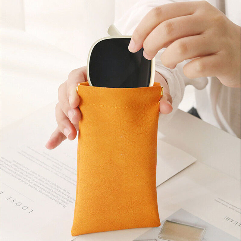 Someone put their cooling glasses into the PU Leather Retro Mouth Automatic Closure Pouch